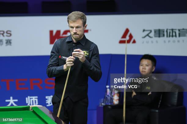 Jack Lisowski of England reacts in the first round match against Zhou Yuelong of China on day 1 of World Snooker Shanghai Masters 2023 at Shanghai...