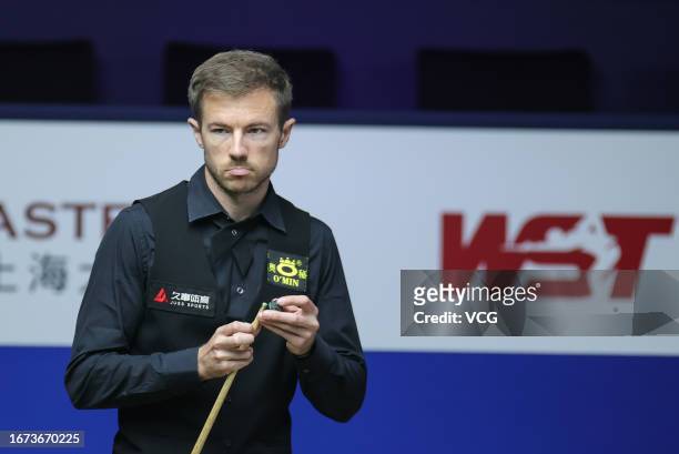 Jack Lisowski of England reacts in the first round match against Zhou Yuelong of China on day 1 of World Snooker Shanghai Masters 2023 at Shanghai...