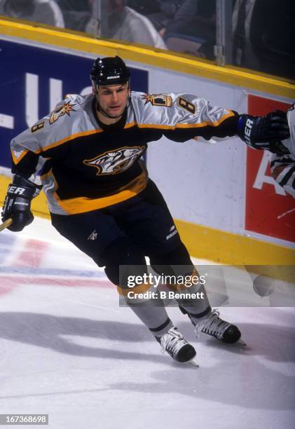 Stu Grimson of the Nashville Predators skates on the ice during an NHL game against the Edmonton Oilers on October 22, 2001 at the Rexall Place in...