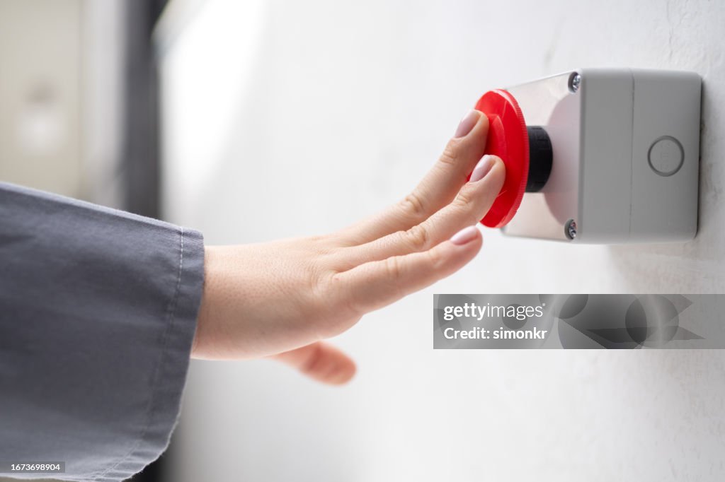 Human hand pushing button