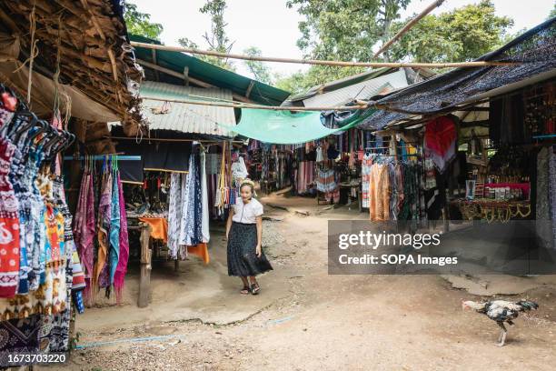 Padaung long-neck woman is seen inside the Baan Tong Luang village in Mae Rim. The Padaung tribe is a subset of the Karenni, which in turn is a...