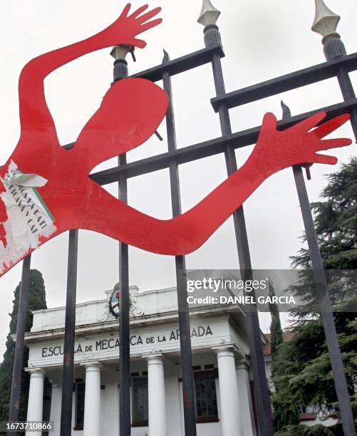 Silhouette representing a missing person is set on the iron fence around the Escuela de Mecanica de la Armada -an infamous torture center where some...