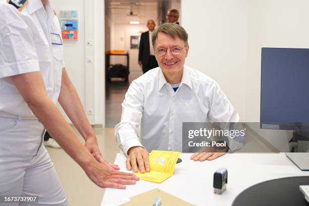 German Health Minister Karl Lauterbach receives a Covid booster vaccine on September 18, 2023 in Berlin, Germany. The German government is...