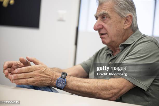 Nick Hayek, chief executive officer of Swatch Group AG, wearing a Swatch x Omega 'Mission to Neptune' MoonSwatch during an interview at the Swatch...