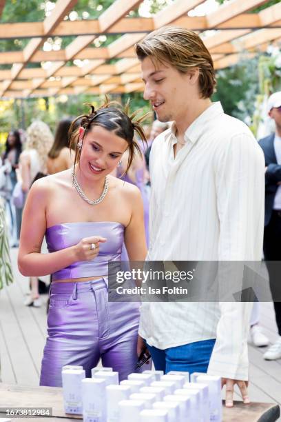 Actress and influencer Millie Bobby Brown and her boyfriend US actor Jake Bongiovi during her Meet And Great on September 9, 2023 in Berlin, Germany.