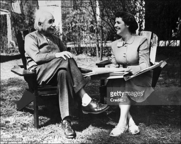 Physicist Albert Einstein, author of theory of relativity, awarded the Nobel Prize for Physics in 1921, is interviewed by Mrs Kenneth Cromwell at...