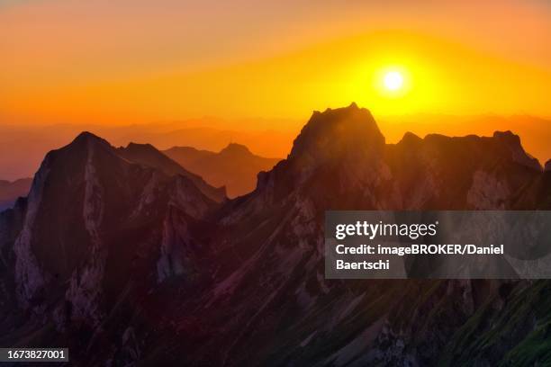 alpstein mountains at sunrise, view of mount hoher kasten, canton appenzell innerrhoden, switzerland - appenzell innerrhoden stock pictures, royalty-free photos & images