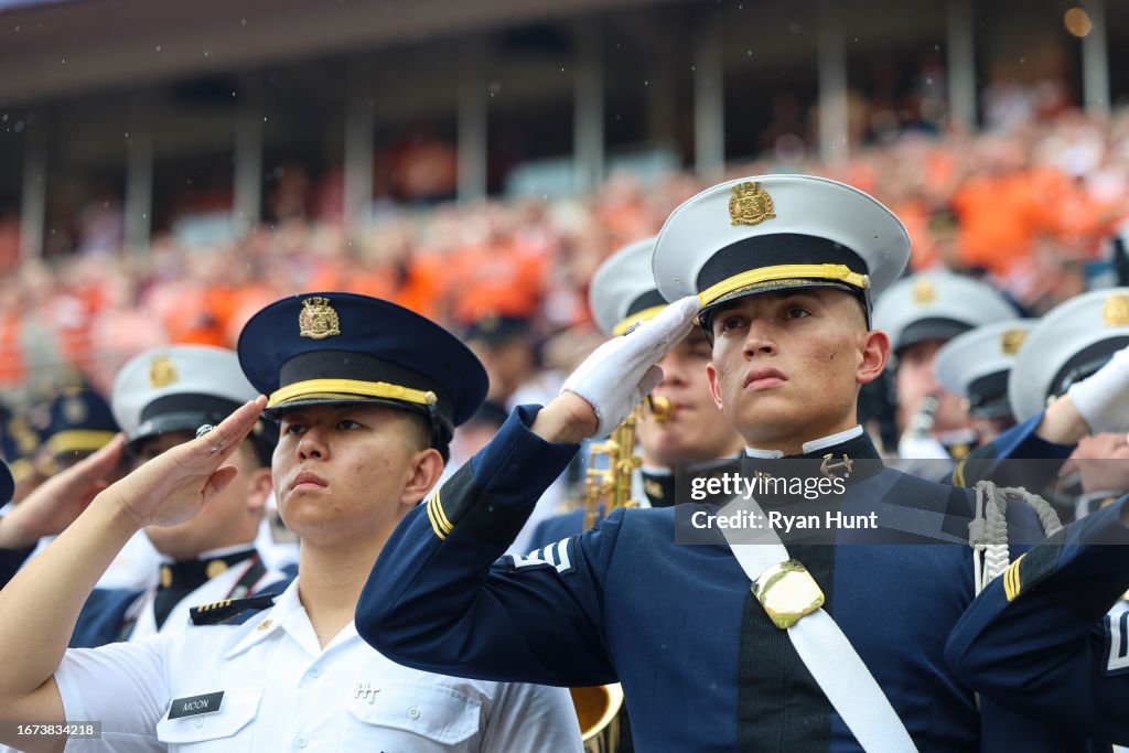 Virginia Tech Color Guard Members of the Virginia Tech Corps of Cadets salute during the... News ...