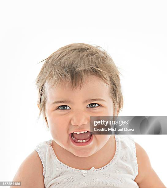 baby screaming yelling in comical but evil way - michael virtue stock pictures, royalty-free photos & images
