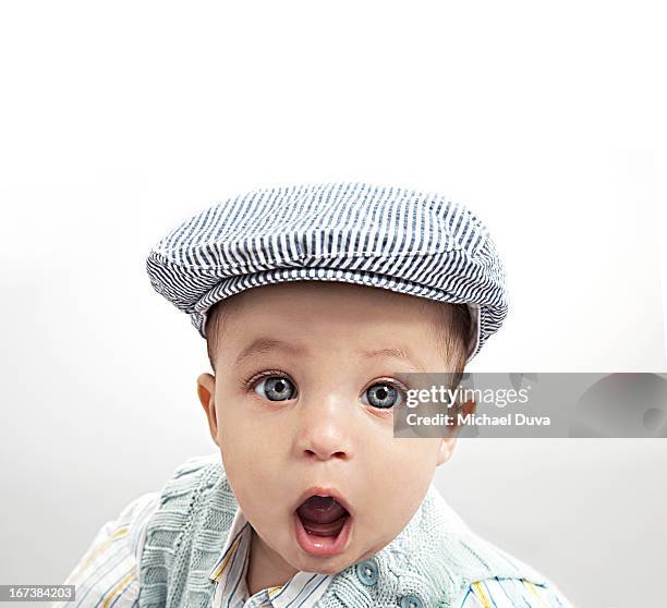 boy shocked and surprised at camera direction - michael virtue stock pictures, royalty-free photos & images