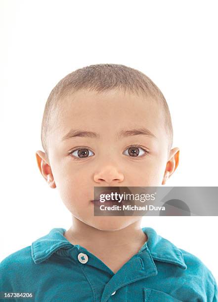studio shot of a child on gray background - michael virtue stock pictures, royalty-free photos & images