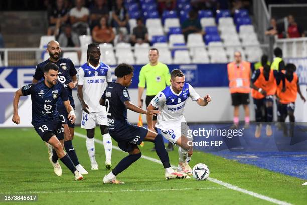 Khalid BOUTAIB - 13 Louis MOUTON - 10 Gaetan PERRIN during the Ligue 2 BKT match between Association de la Jeunesse Auxerroise and Pau Football Club...