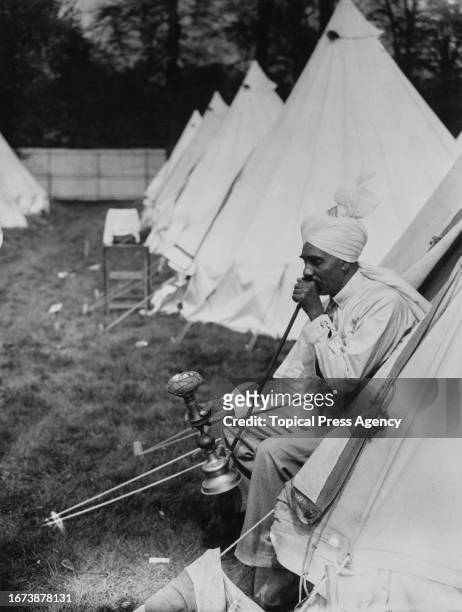 An officer of the Indian contingent stationed at the temporary Hampton Court headquarters for the coronation of King George VI, 5th May 1937.