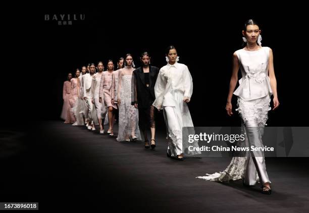 Models walk the runway at Joy Yard - XU CUN Fashion Release during the China Fashion Week S/S 2024 at 751D.PARK on September 11, 2023 in Beijing,...