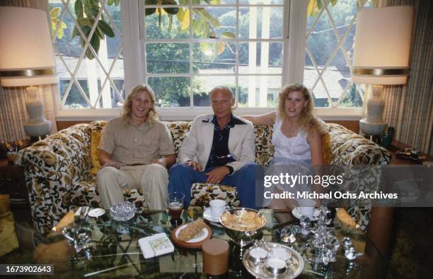 Astronaut Buzz Aldrin, with his children Andrew and Janice, at his home, taken by photographer Michael Montfort, United States, 23rd June 1979.