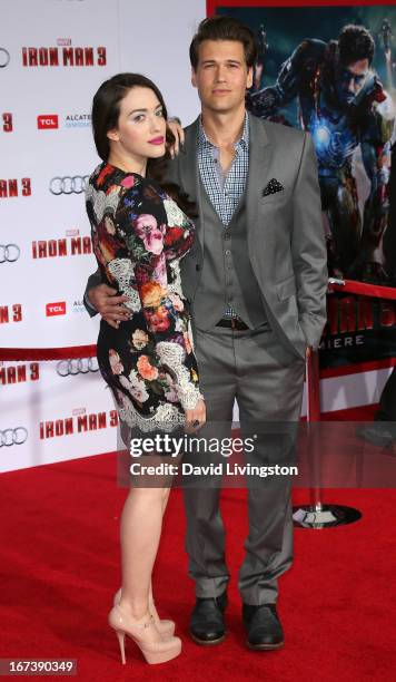 Actors Kat Dennings and Nick Zano attend the premiere of Walt Disney Pictures' "Iron Man 3" at the El Capitan Theatre on April 24, 2013 in Hollywood,...