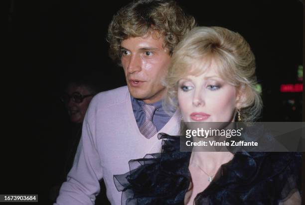 Morgan Fairchild and Alex Smith attend an event, United States, 1982.