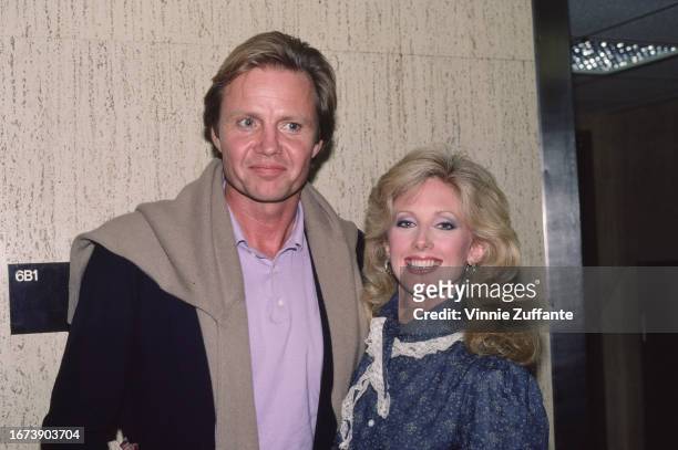 Jon Voight and Morgan Fairchild attend an event, United States, circa 1980s.