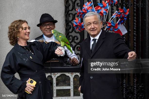 Mexican President Andres Manuel Lopez Obrador and his wife Beatriz Gutierrez Mullero pose for photos after arriving to La Moneda presidential palace...