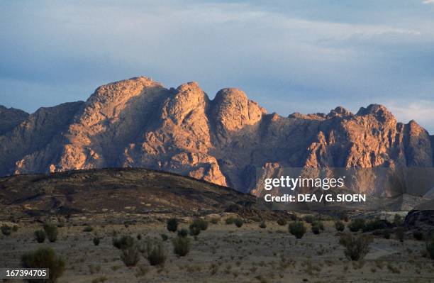 Sunset in the desert near the massif of Mount Sinai or Moses' Mountain, Sinai Peninsula, Egypt.