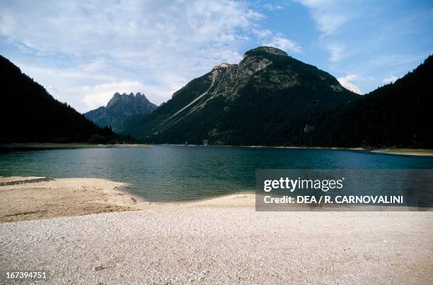 Lake Predil and the peak of Cima del Lago, Cinque Punte , Val Rio del Lago and Tarvisio Forest in the background, Friuli-Venezia Giulia, Italy.