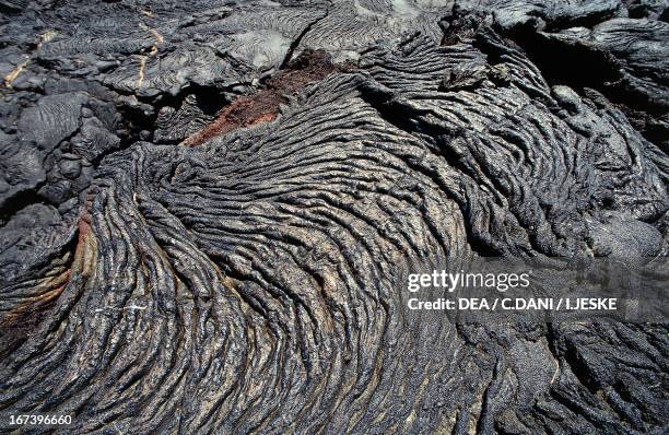 Lava flowing in ropes or cords, Santiago Island, Galapagos Islands, Ecuador.