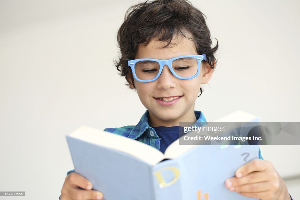 Boy reading  a book