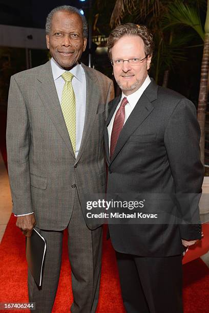 Actor Sidney Poitier and Bob Gazzale AFI President and CEO arrive on the red carpet for Target Presents AFI's Night at the Movies at ArcLight Cinemas...