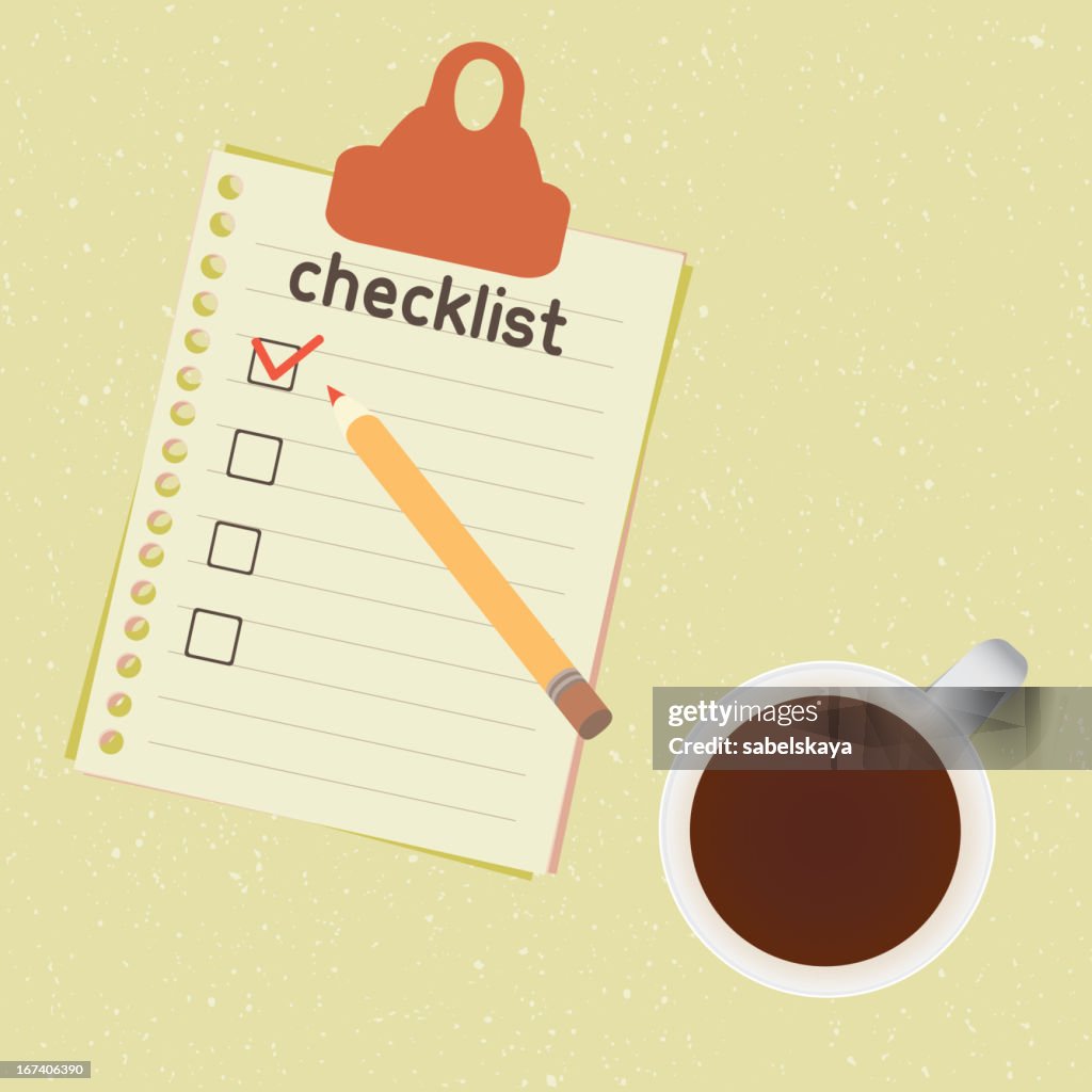 Checklist and cup of coffee