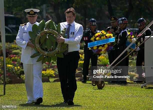Tony Lynch, New Zealand Ambassador to Thailand prepares to lay a wreath during the Wreath Laying Ceremony at the Kanchanaburi War Cemetery April 25,...