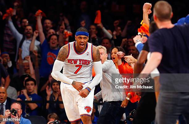 Carmelo Anthony of the New York Knicks reacts after a basket against the Boston Celtics during Game Two of the Eastern Conference Quarterfinals of...