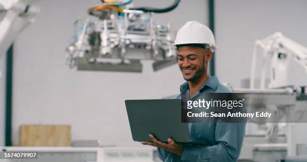 engineering, man and robotics, laptop and programming of robot with machine learning and high tech. innovation, future technology and engineer, workshop and automation with industry 4.0 and software - metal workshop stockfoto's en -beelden