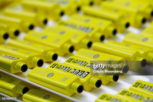 Mascara containers sit on the production line for manufacturing cosmetics containers at the Jangup System Co. Factory in Yongin, South Korea, on...