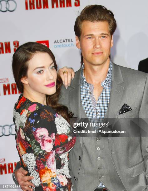 Actor Nick Zano and actress Kat Dennings attend the premiere of Walt Disney Pictures' 'Iron Man 3' at the El Capitan Theatre on April 24, 2013 in...