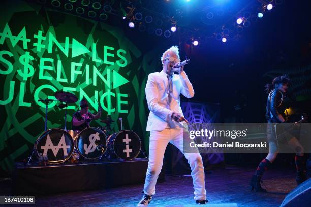 Kitty, Jimmy Urine and Lyn-Z of Mindless Self Indulgence perform on stage at House Of Blues Chicago on April 24, 2013 in Chicago, Illinois.