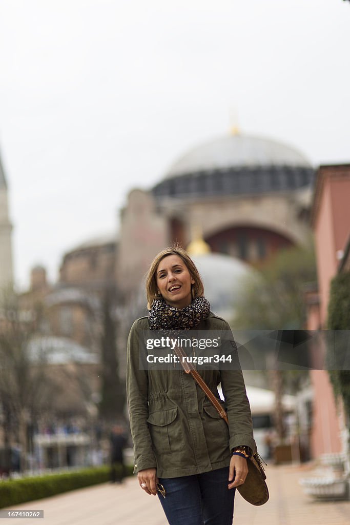 Pretty traveller woman - Hagia Sophia Museum in the background