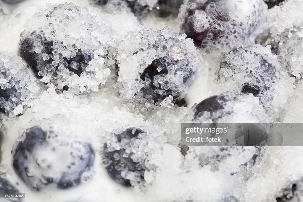 Blueberries whipped cream and sugar