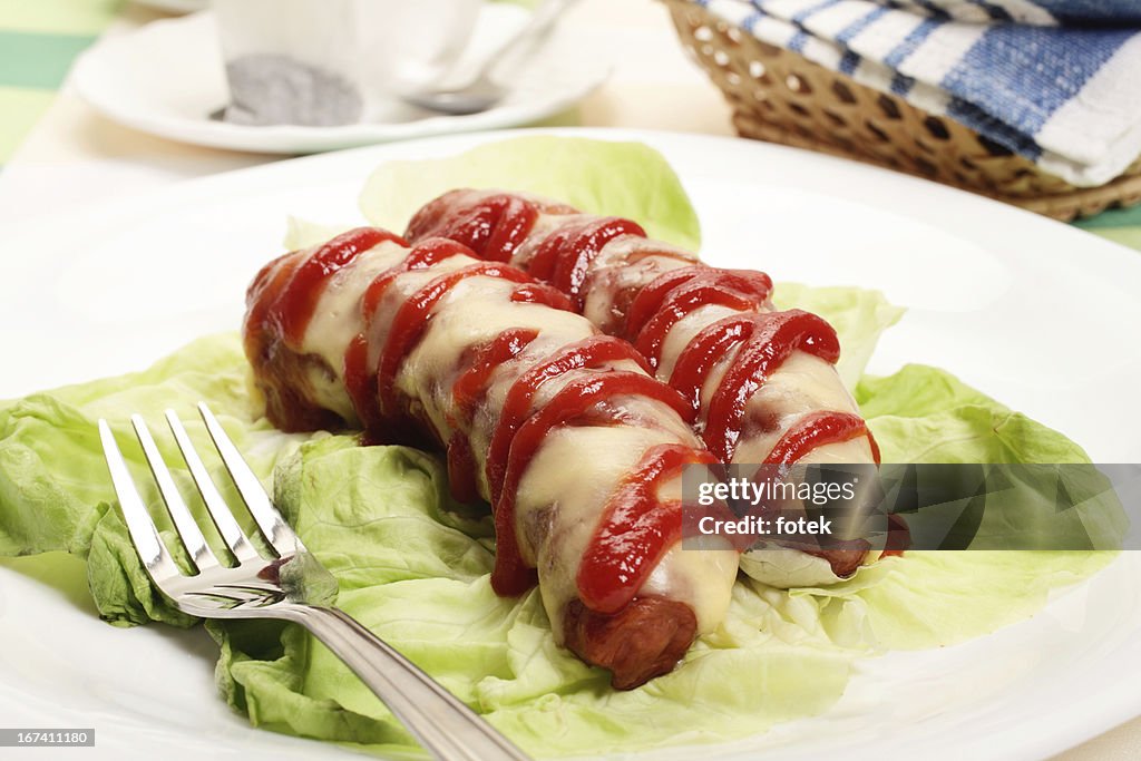 Baked sausage witch cheese