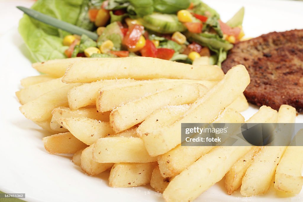 French fries, salad and chop