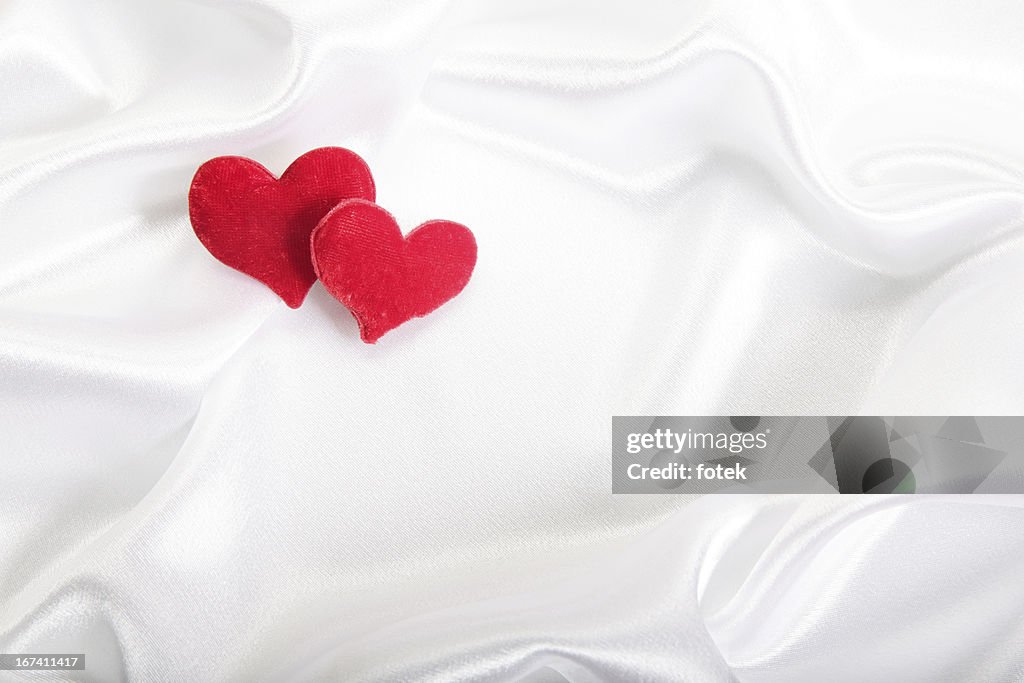 Hearts on satin Hintergrund