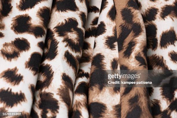 leopard pattern print texture background. intimate fabric close-up - glamour live show fashion shows stock pictures, royalty-free photos & images