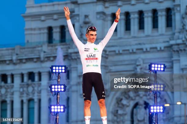 Juan Ayuso is awarded with the white jersey as the best youth cyclist of the Spanish bicycle race La Vuelta on the podium at Plaza de Cibeles.