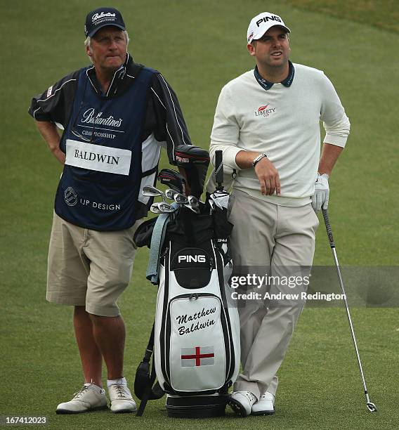 Matthew Baldwin of England and his caddie Julian Phillips in action during the first round of the Ballantine's Championship at Blackstone Golf Club...