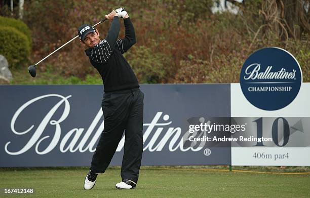 Louis Oosthuizen of South Africa hits his tee-shot on the tenth hole during the first round of the Ballantine's Championship at Blackstone Golf Club...