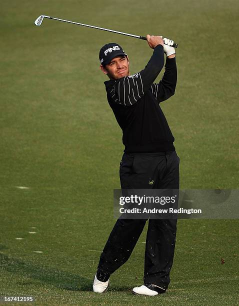 Louis Oosthuizen of South Africa plays his second shot on the tenth hole during the first round of the Ballantine's Championship at Blackstone Golf...