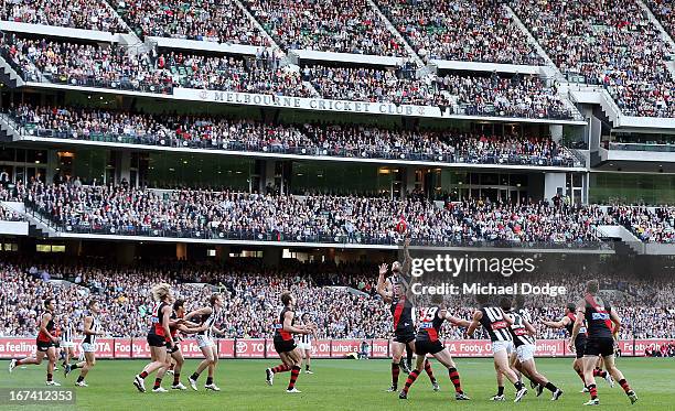 General view as Ben Hudson of the Magpies wins the tap in the ruck over David Hille of the Bombers during the round five AFL match between the...