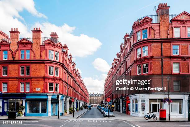 red townhouses in marylebone, london, uk - façade stock pictures, royalty-free photos & images