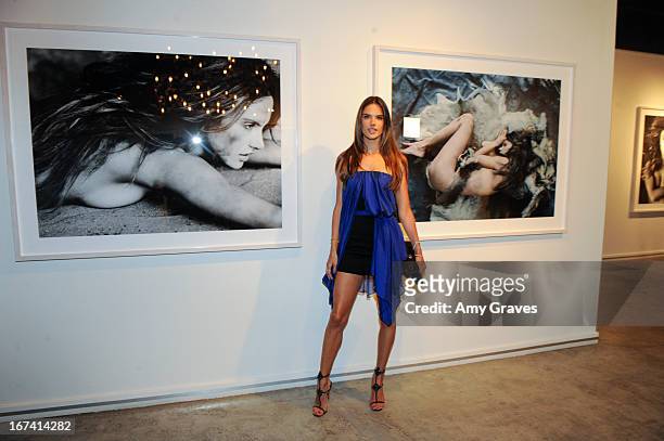 Alessandra Ambrosio attends Nomad Two Worlds and Russell James Private Reception at Guy Hepner Gallery on April 24, 2013 in Hollywood, California.