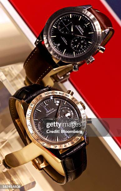 Speedmaster wristwatches manufactured by Omega, a unit of Swatch Group AG, sit on display during the Baselworld watch fair in Basel, Switzerland, on...