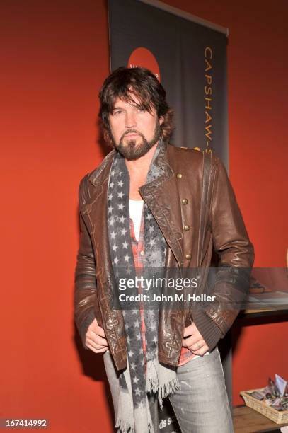 Singer Billy Ray Cyrus signs copies of his new book "Hillbilly Heart" and performs at the New Roads School Moss Theater on April 24, 2013 in Santa...